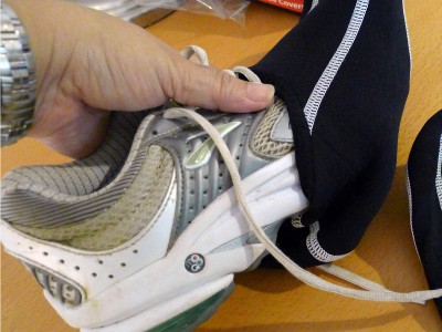 Inserting a shoe into a Shoesock.
